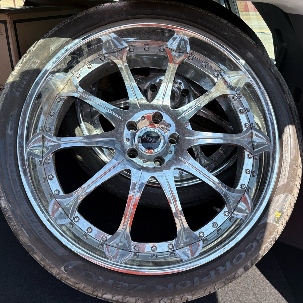 chrome 24” wheels 5x120 lug but adapters are made for all makes and models